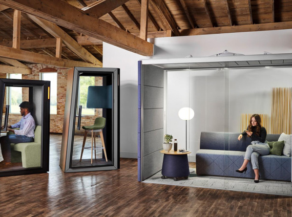 A workplace featuring the QT booth from Orangebox