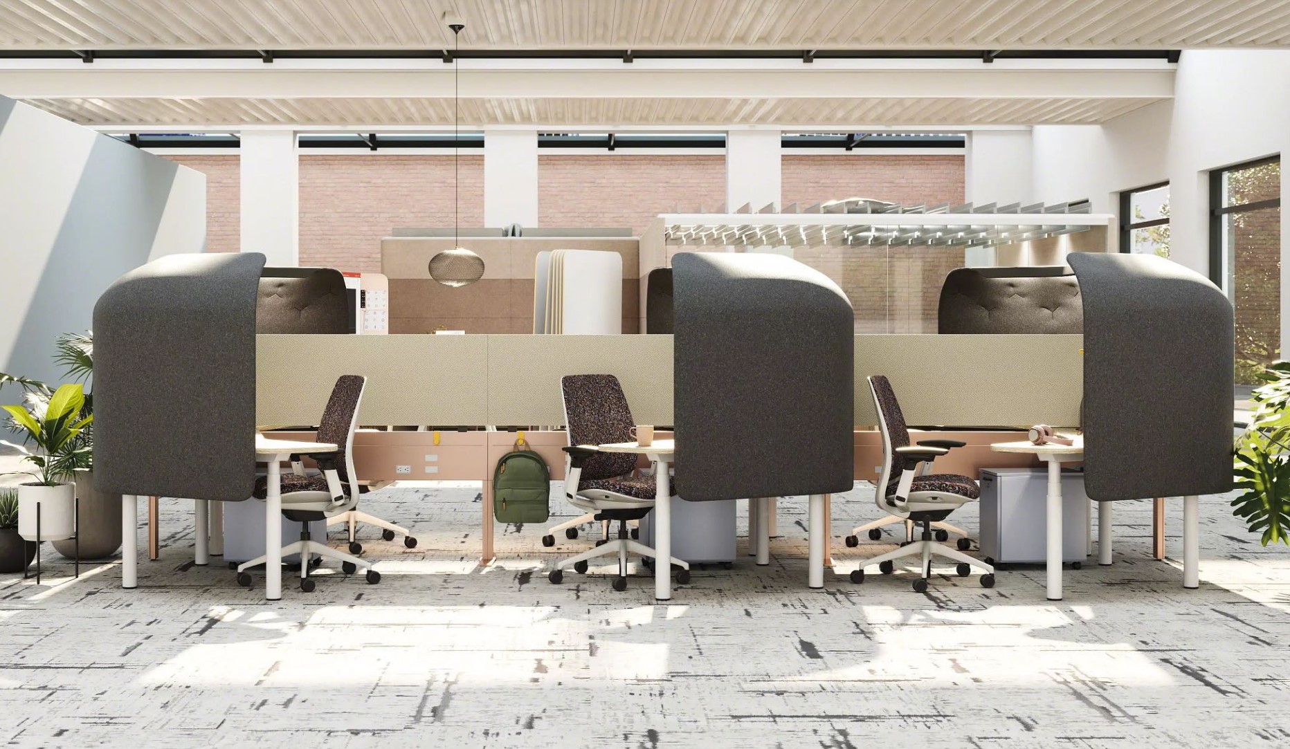 A bright but calm office environment featuring environmentally responsible furniture.